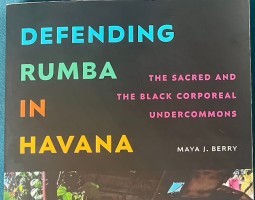 a book with a black cover and and the words Defending Rumba in Havana; The Sacred and Black Corporeal Undercommons written in blue, green, organge, yellow and pink.