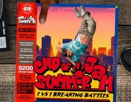 An unseen person holds a colorful event flyer over a wooden surface alongside a DJ turntable an a pair of black sneakers. Vibrant and dynamic, the flyer depicts a sunset city skyline in the background and a breaker, wearing a teal patterned shirt and cargo pants, frozen in mid-air performing an impressive freeze. The title “End of Summer Jam” is boldly displayed in graffiti-style red lettering with the subtitle “1 vs 1 Breaking Battles” below it in black on yellow. The left side of the flyer is red and contains event details, including the date (08•17•25), time (Doors 3PM), and entry fee ($10). It also lists the venue — Philly Movements Dance Company in Philadelphia, PA — and mentions a $200 grand prize. Additional info includes the DJ (Jey Prime), the judges (Fierce One, B-Girl Gloh, and Mikey), and the host (Wrath of Khan). The overall design is energetic and urban, capturing the spirit of a Philadelphia breakin' competition.